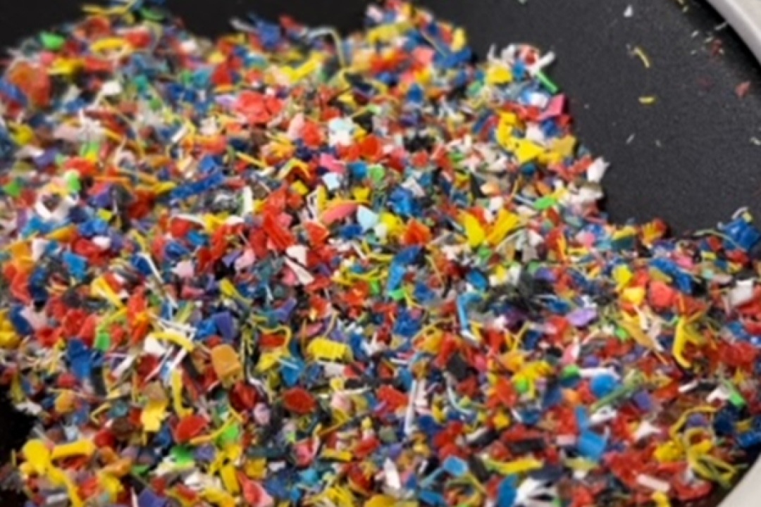 Shredded plastic waste in small particle form