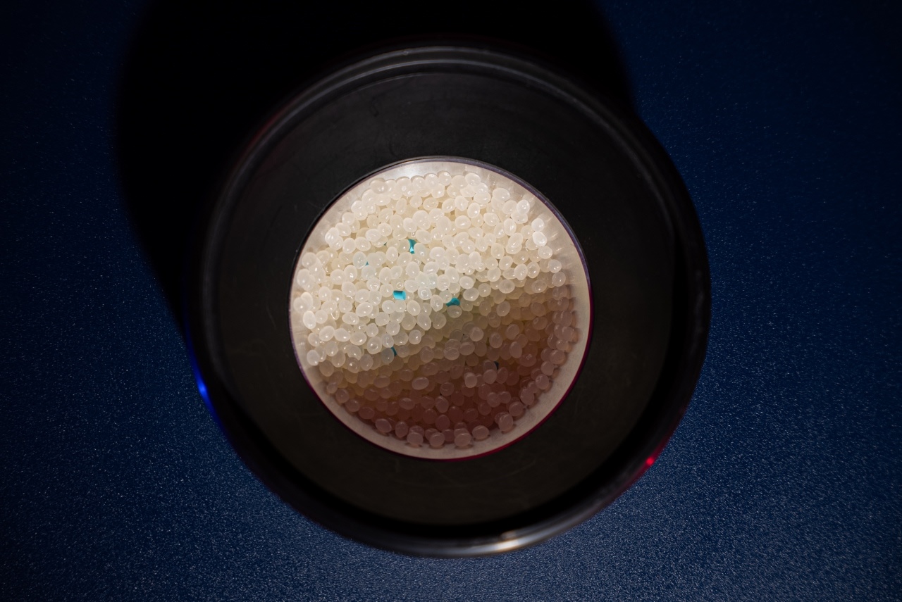 A top view of the hopper, filled with PLA