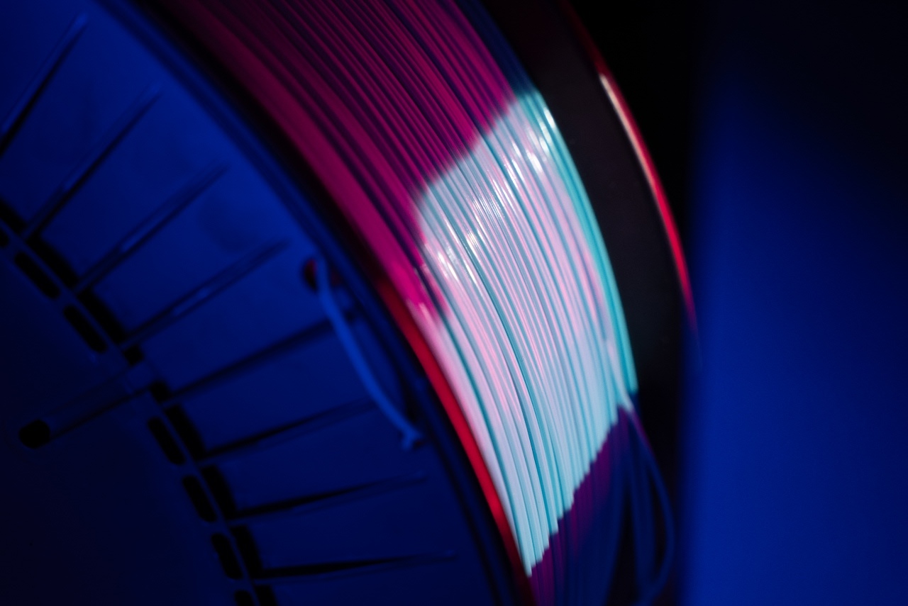 The front of a 3kg spool of light blue filament