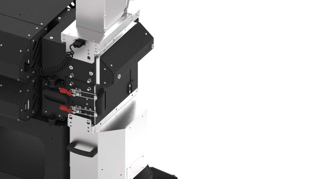 The safety pins attaching the container onto the machine.