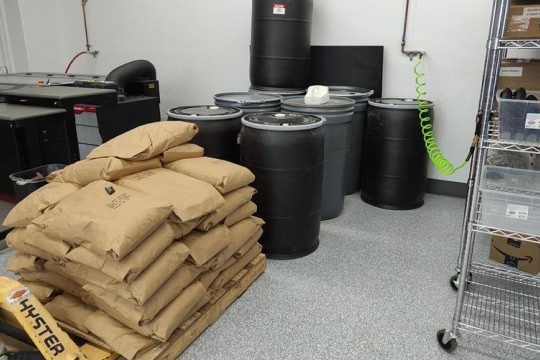 Piles of SLS waste powder.