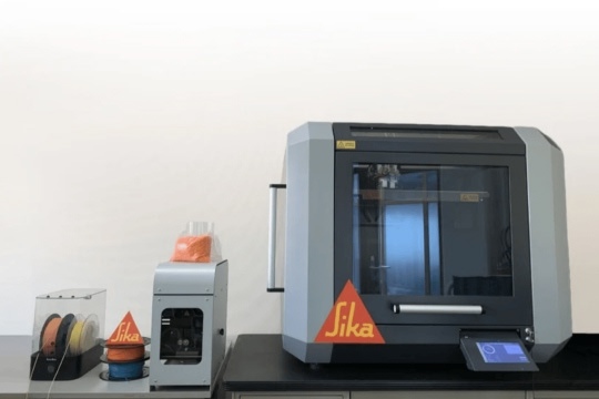 Sika's Printer next to the filament maker ONE.