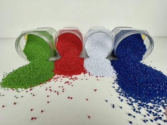 Green, red, white and blue colorants