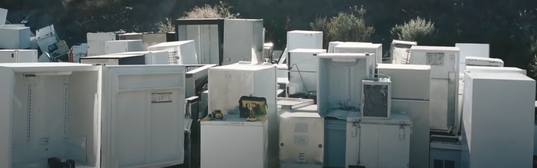 A landfill with old fridges.