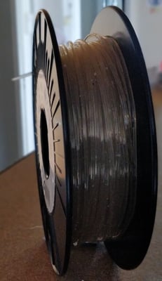 Recycled PLA filament on a spool