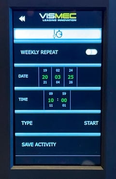 The Vismec Dryer touchscreen with the timer settings on display, allowing the user to set the date, time and type of timer.