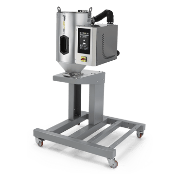 The brushed metallic Vismec Dryer standing on a metal trolley.