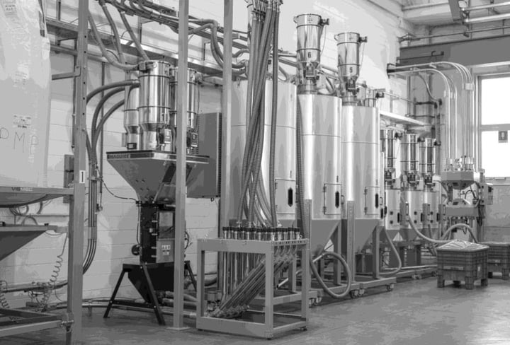 3 Vismec Dryers next to each other inside a production lab.