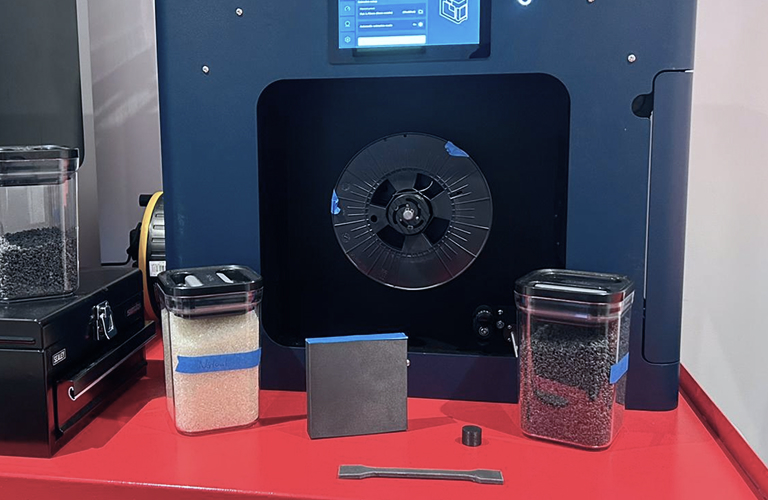 Monolith Virgin Materials and Printed Sample next to the Filament Maker TWO
