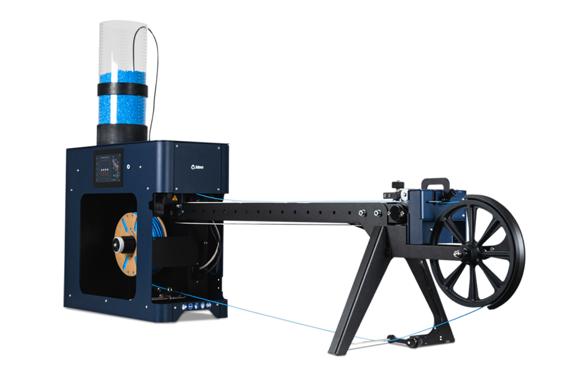Full view of the 3devo FMX10 filament maker, showing the SmartFlow Hopper, touchscreen, cooling path, and winder wheel in one continuous line.