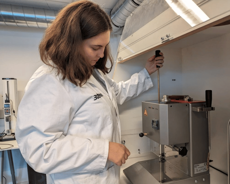 Materials Specialist conducts MFI test for plastic filament extrusion
